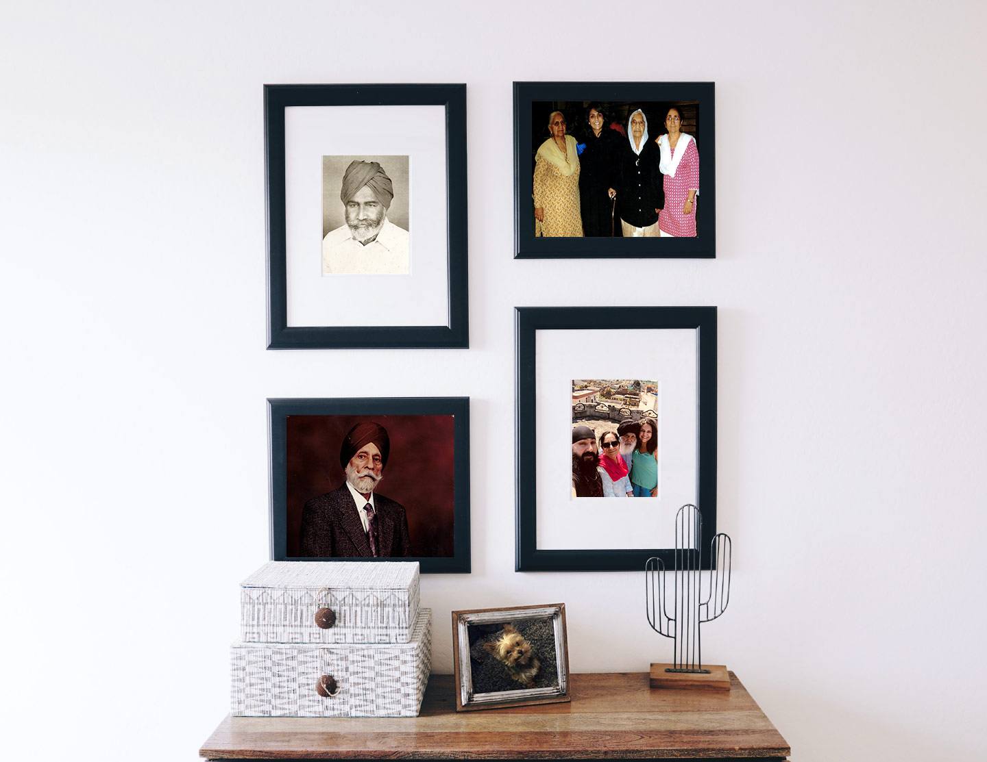 Gagan K. Sangha photo wall frames set up as a collage above a small table